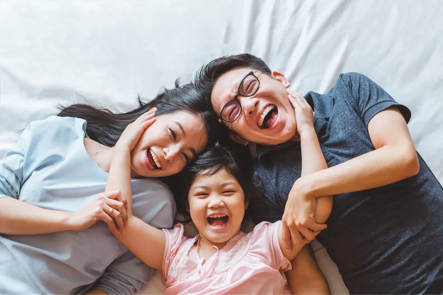 Happy family laughing together