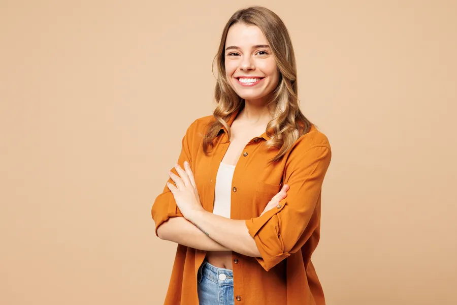 Confident young woman smiling