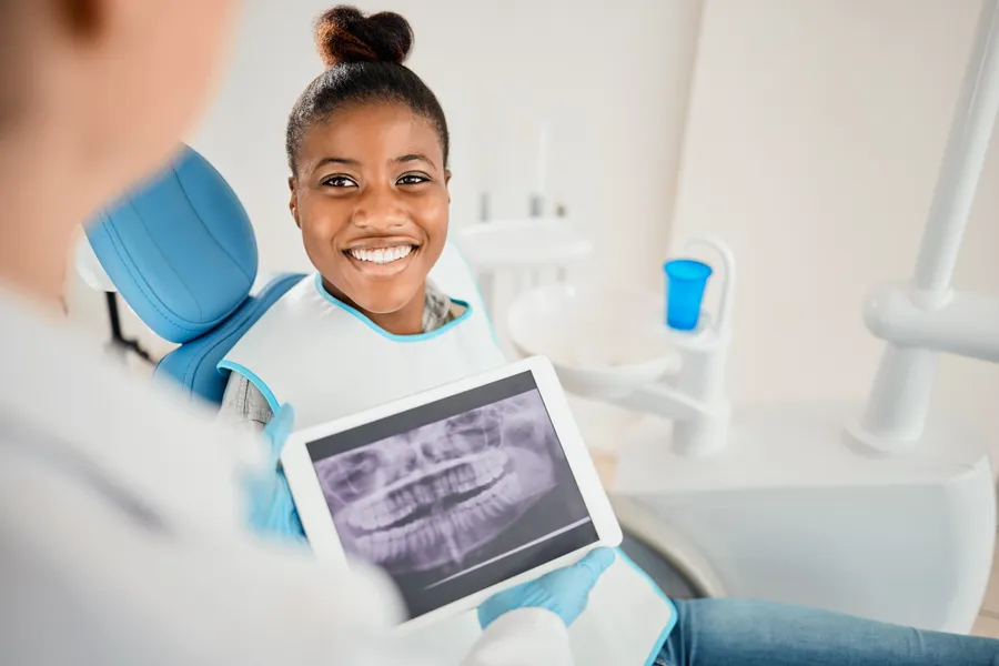 Patient smiling during a dental visit