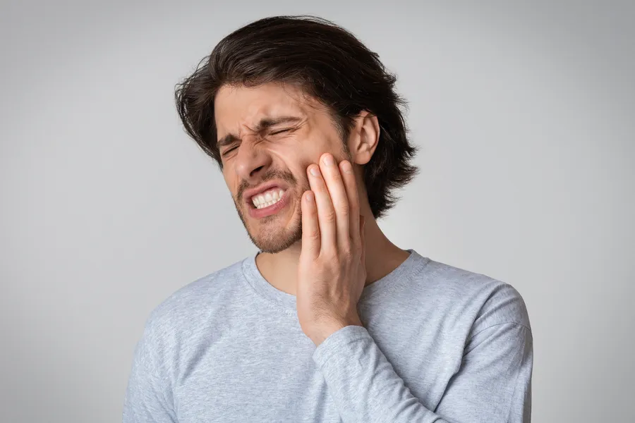 Person experiencing tooth pain