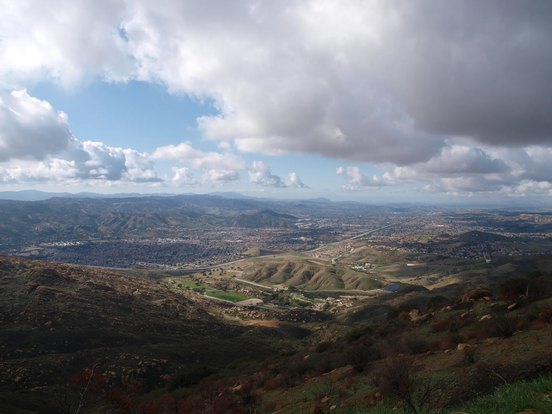 Hilltop panorama of Simi Valley under dramatic clouds